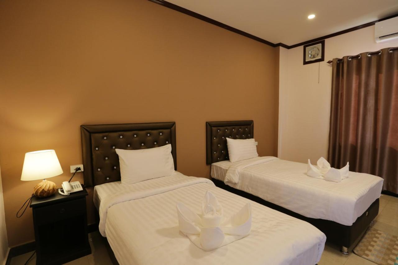 Khounmixay Hotel Вьентьян Экстерьер фото