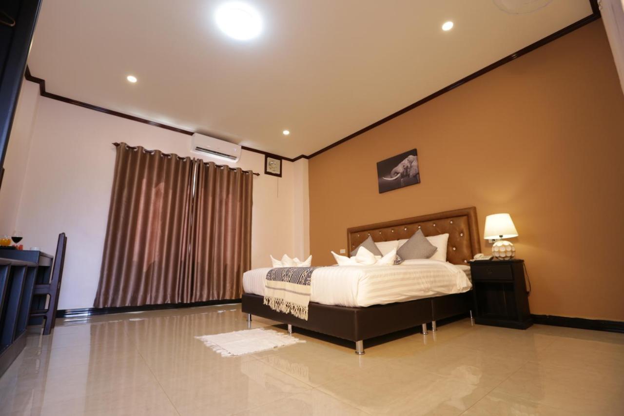 Khounmixay Hotel Вьентьян Экстерьер фото
